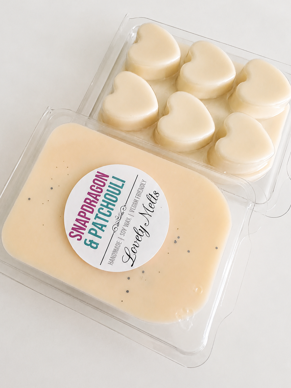 Packaged wax melts with heart-shaped bars on a white background