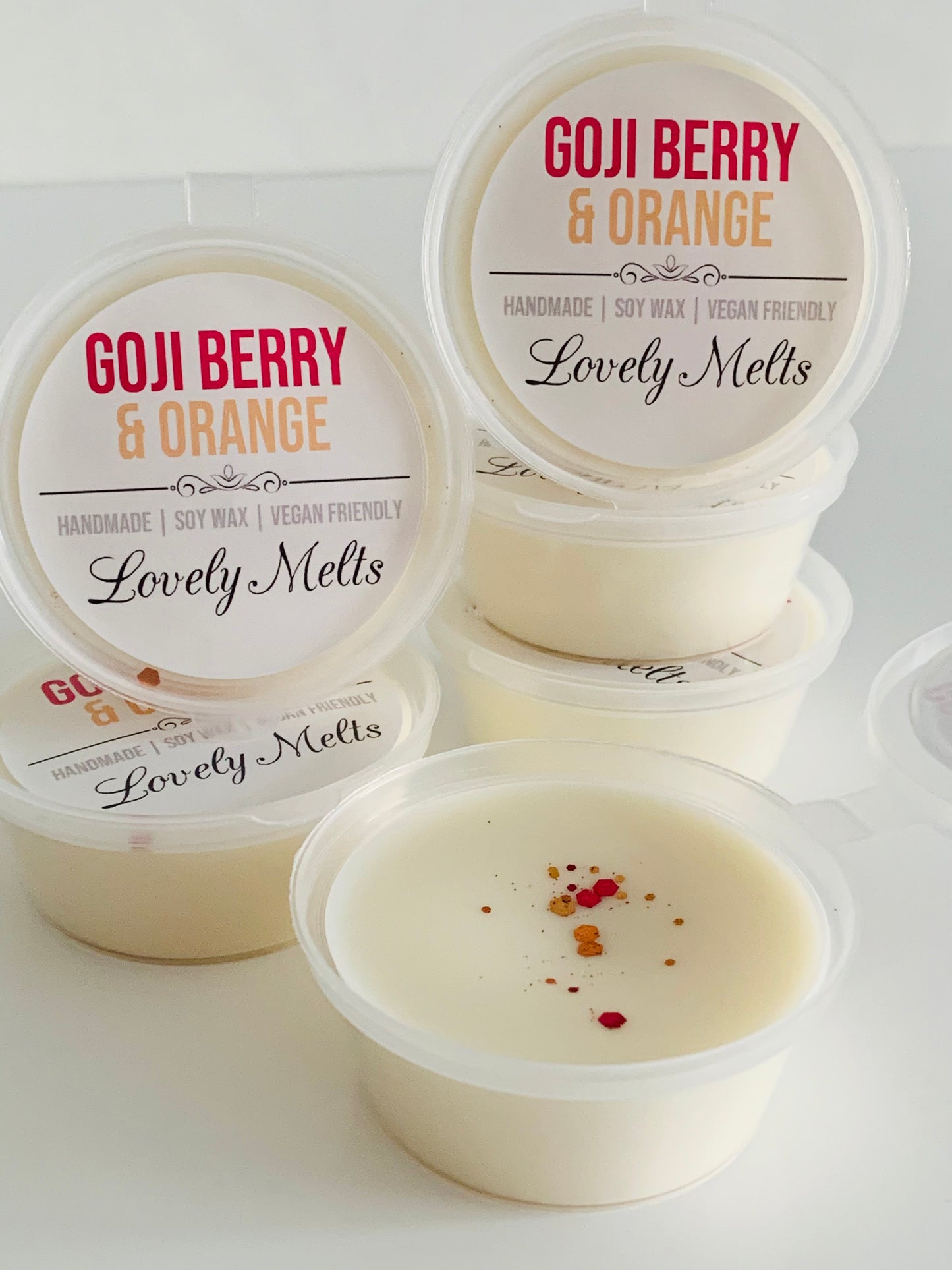 goji berry and orange soy wax melts in pots