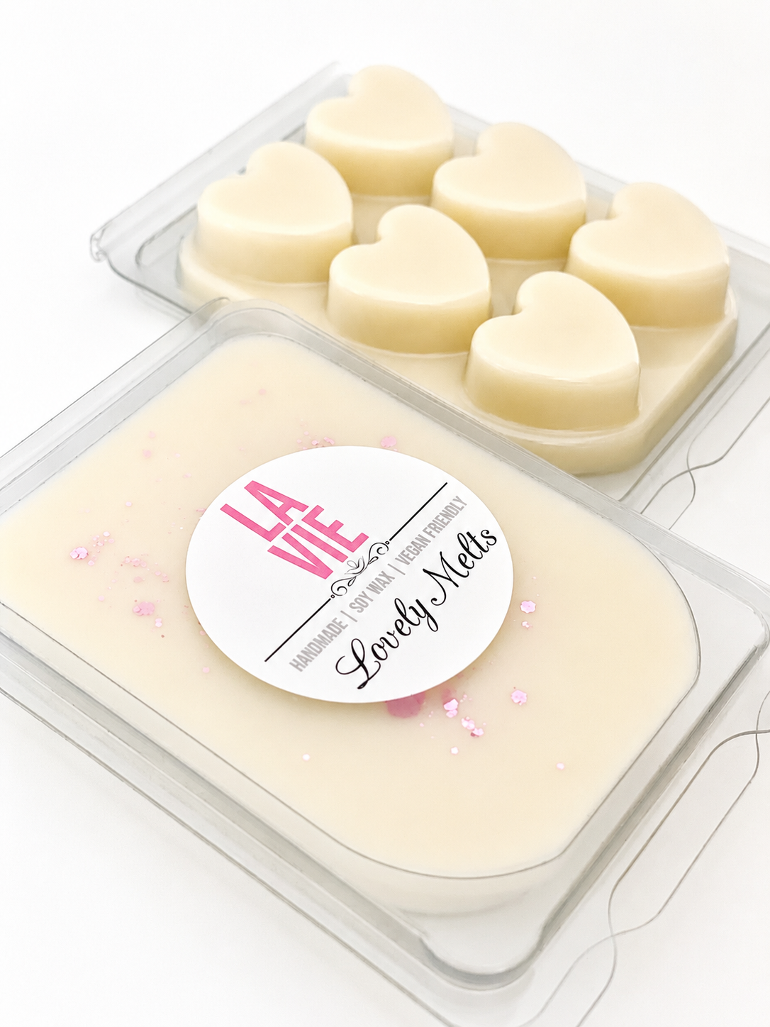 Heart-shaped soap bars in a packaging with 'La Vie' label on a white background