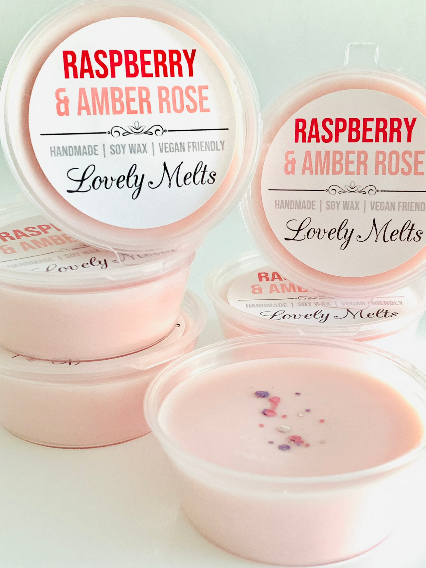 raspberry and amber rose wax melt pots