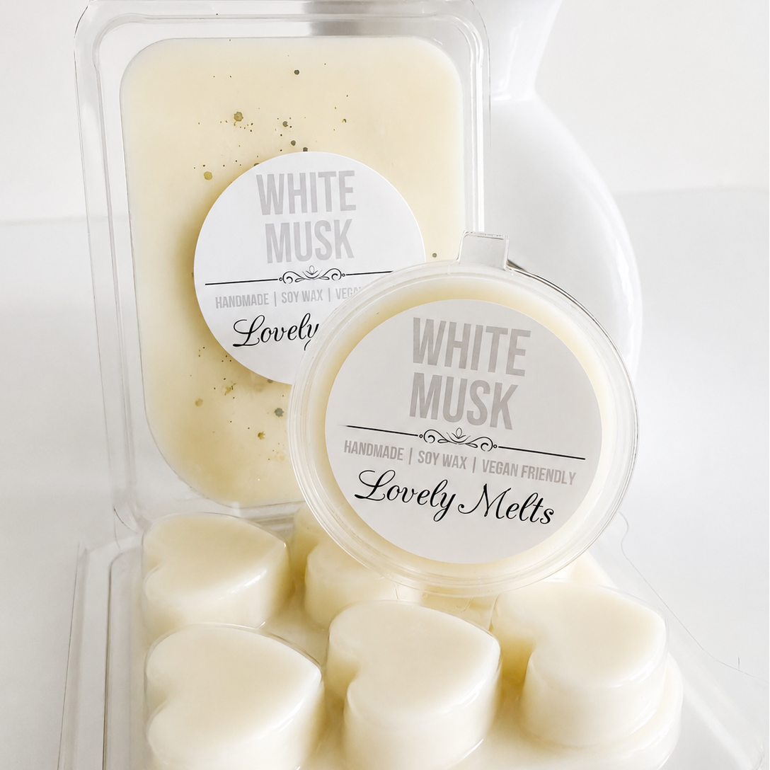 Packaged wax melts labeled 'White Musk' by 'Lovely Melts' on a white background.