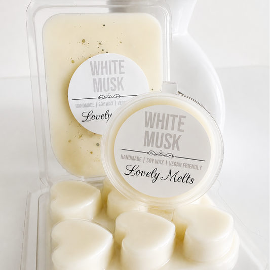 Packaged wax melts labeled 'White Musk' by 'Lovely Melts' on a white background.