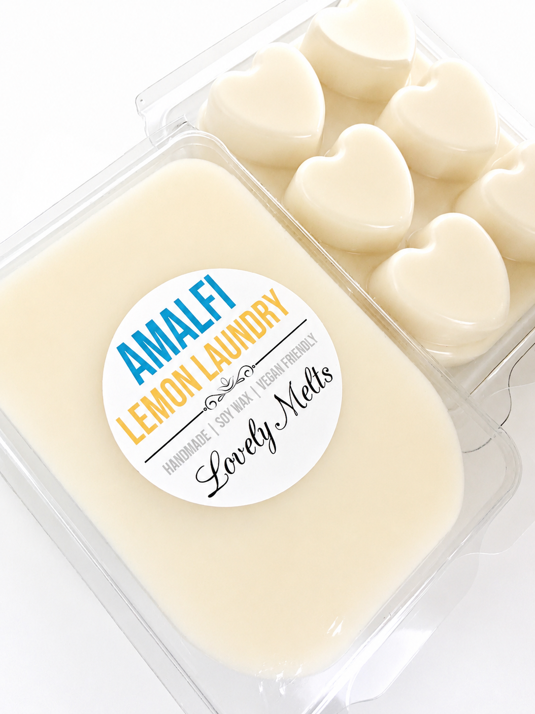 Pack of heart-shaped wax melts with 'Amalfi Lemon Laundry' label on a white background