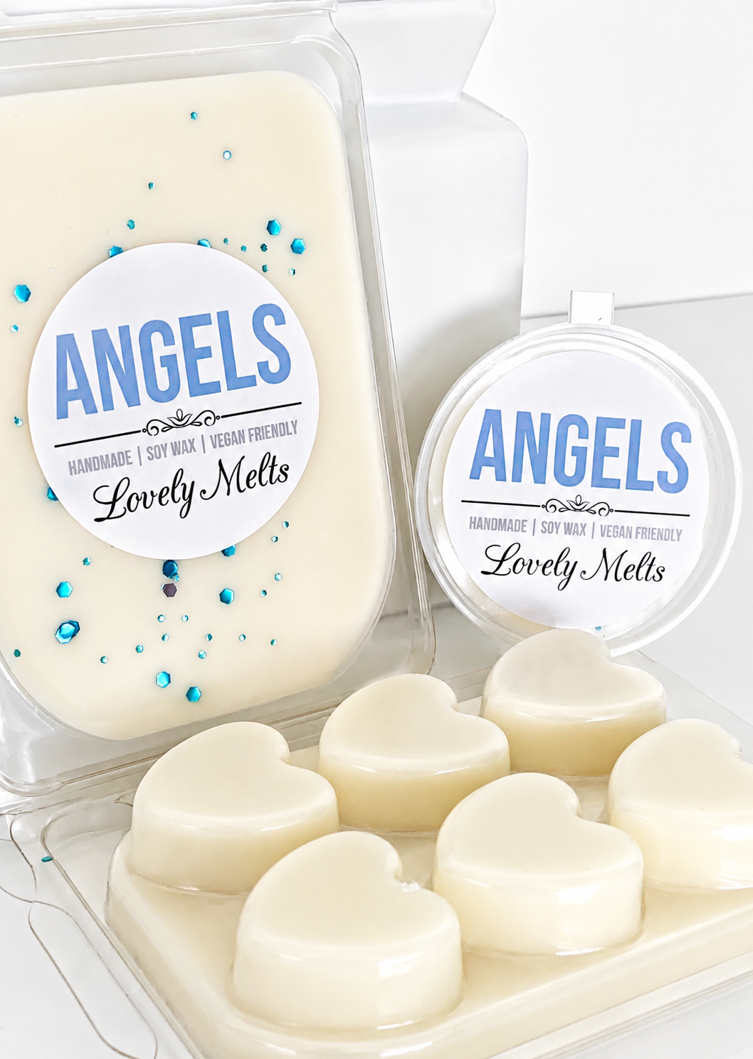Heart-shaped wax melts in a clear packaging with 'ANGELS' branding.