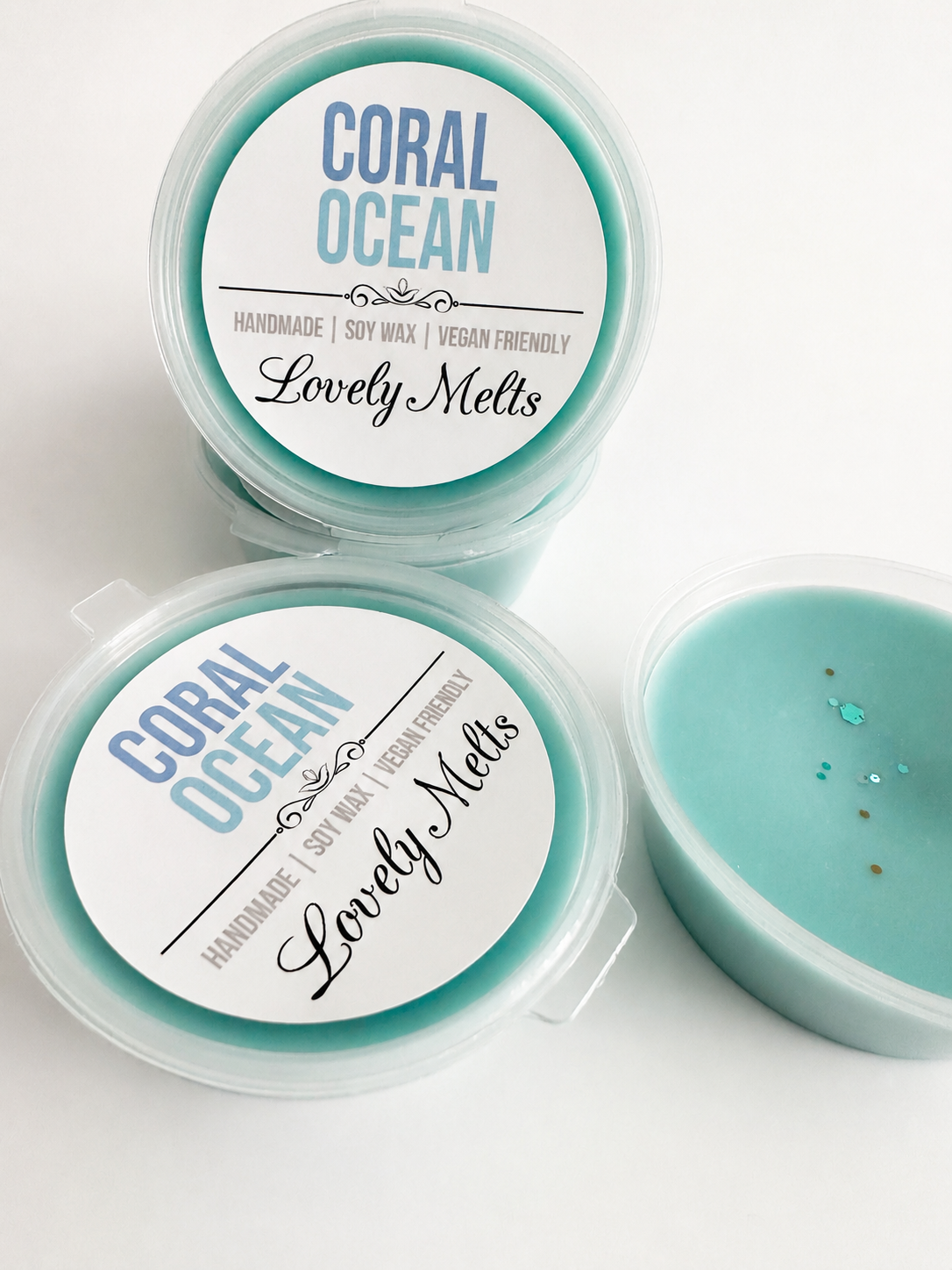 Coral Ocean soy wax melt pots with branded labels