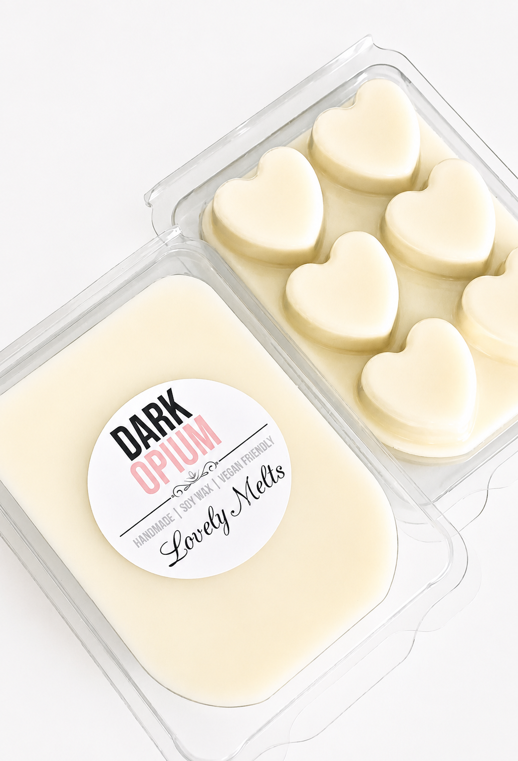 Heart-shaped wax melts in a container with a 'Dark Opium' label.