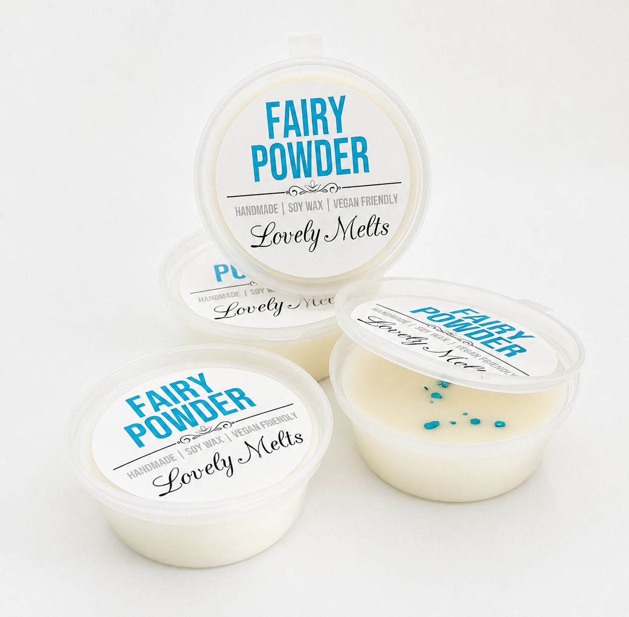 Three containers of 'Fairy Powder' by Lovely Melts on a white background