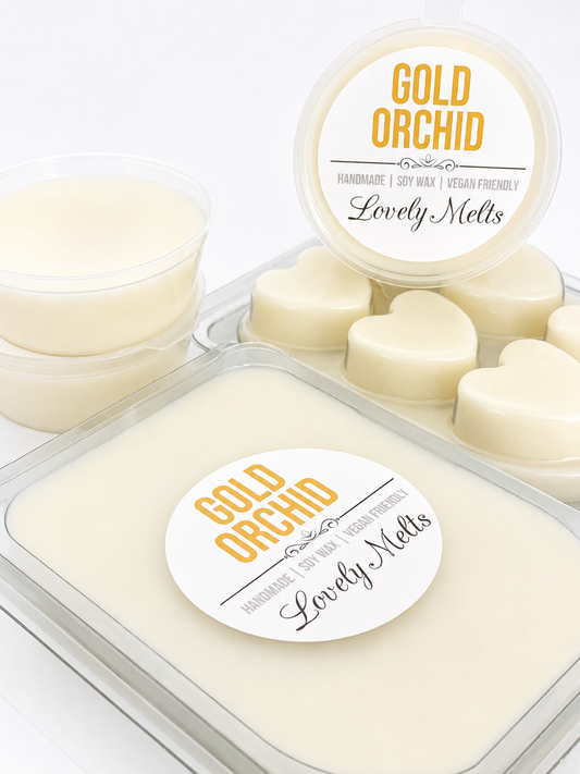 Gold Orchid Lovely Melts wax melts in clear containers on a white background