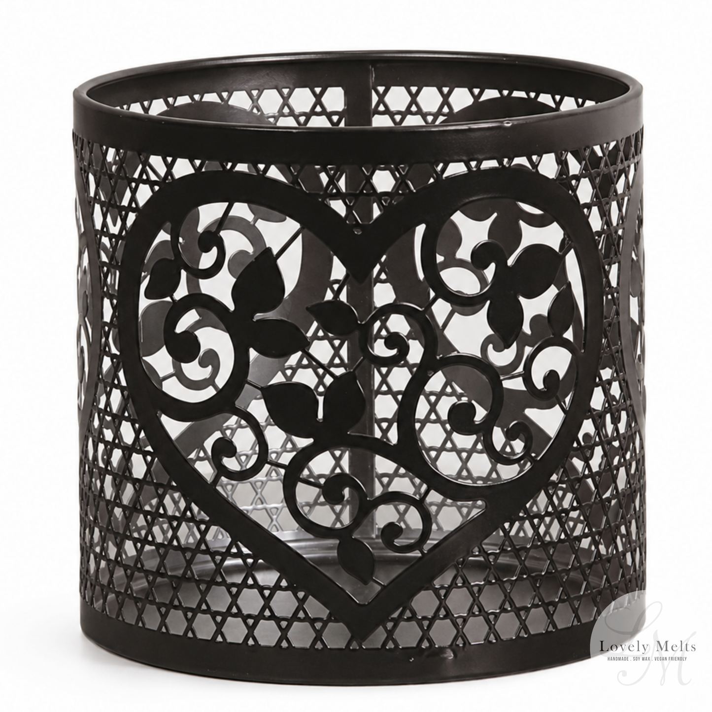 Black metal candle holder with heart design on a white background