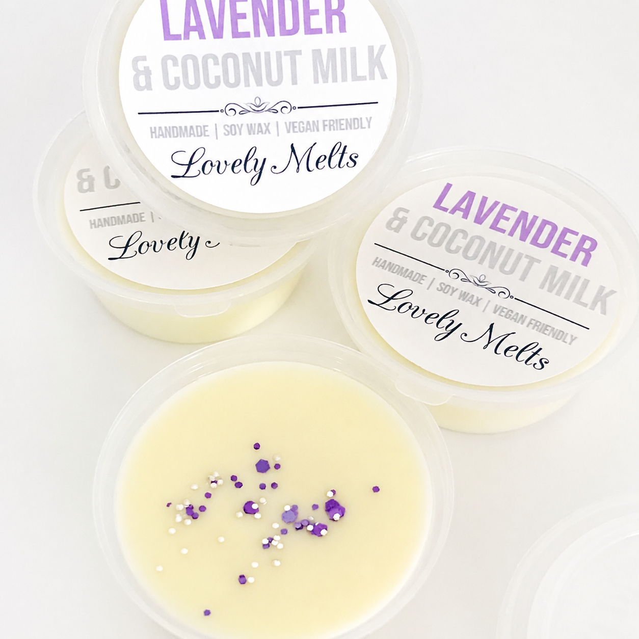 Lavender & Coconut Milk scented wax melts with 'Lovely Melts' branding on a white background.