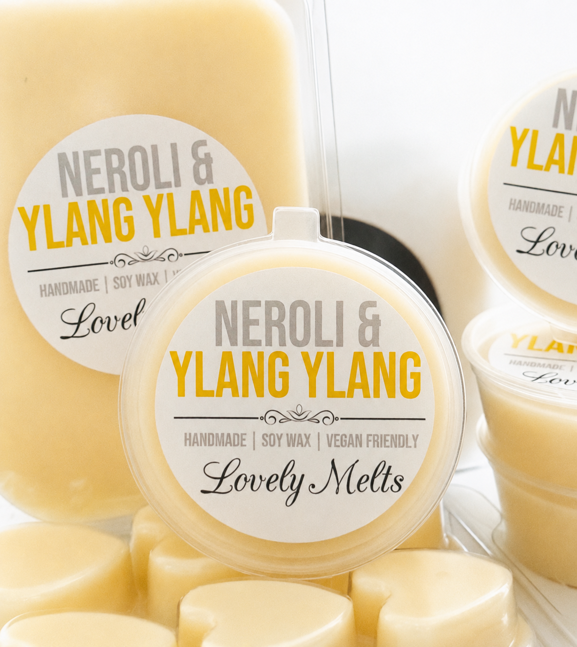 Neroli & Ylang Ylang wax melts with visible branding on a white background