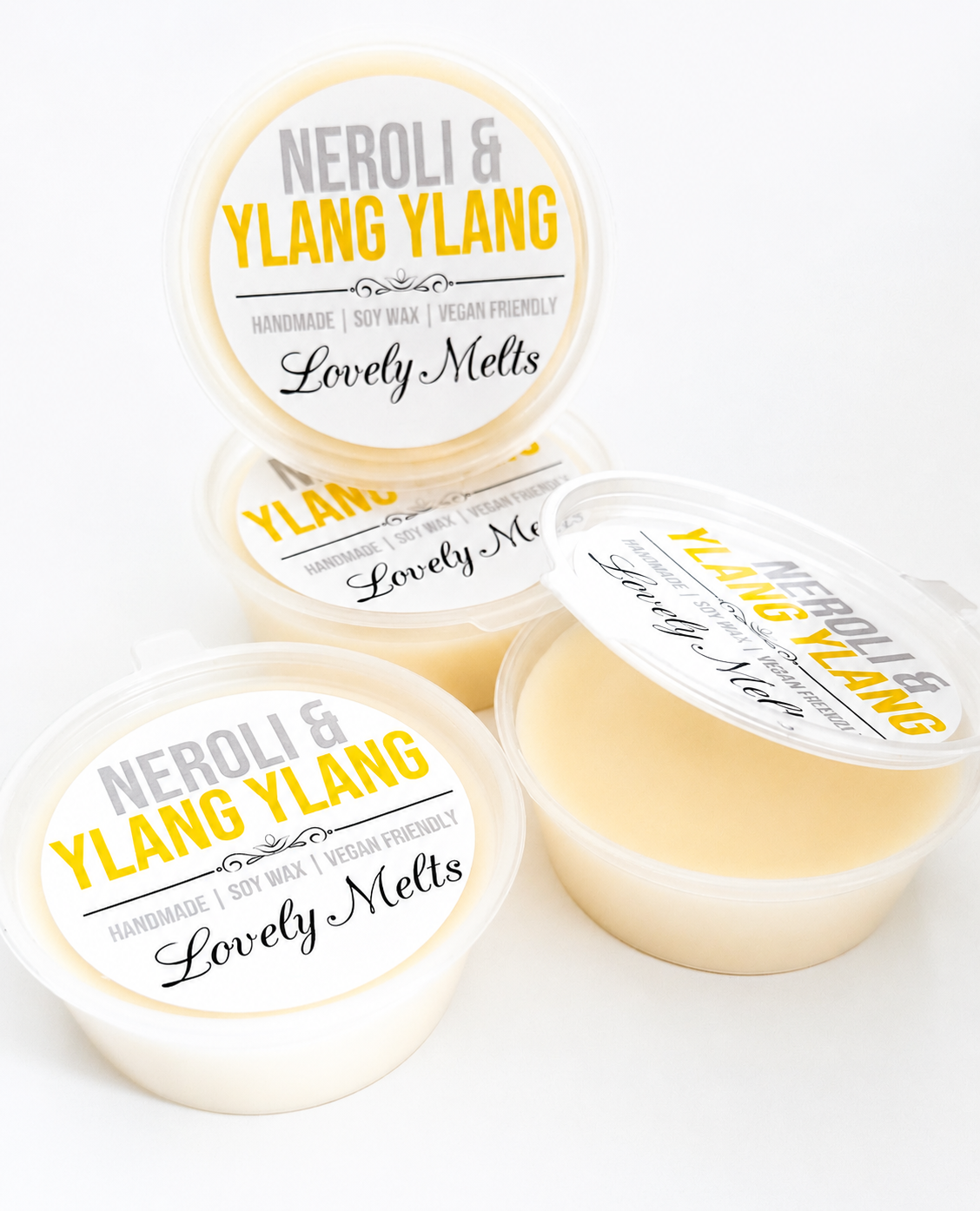 Four containers of 'Neroli & Ylang Ylang' scented WAX MELT product with visible branding on a white background.