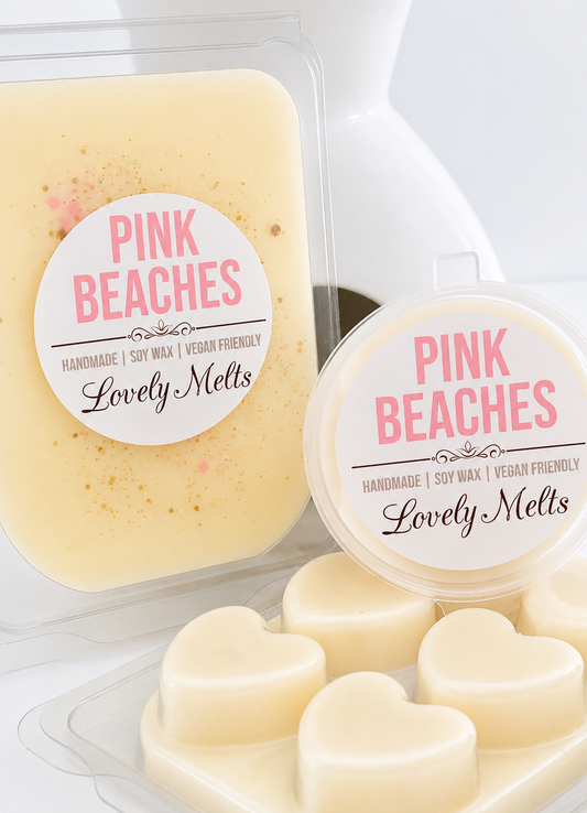 Heart-shaped wax melts with 'Pink Beaches' branding on a white background