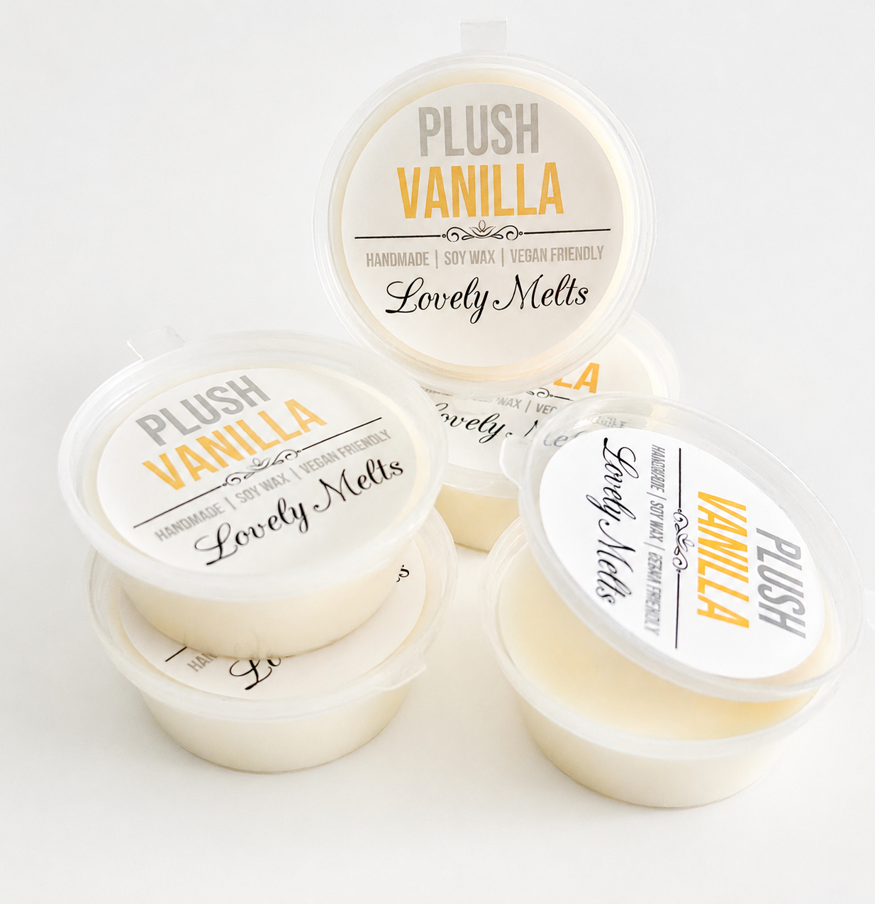 Three containers of Plush Vanilla Lovely Melts Wax Melts on a white background