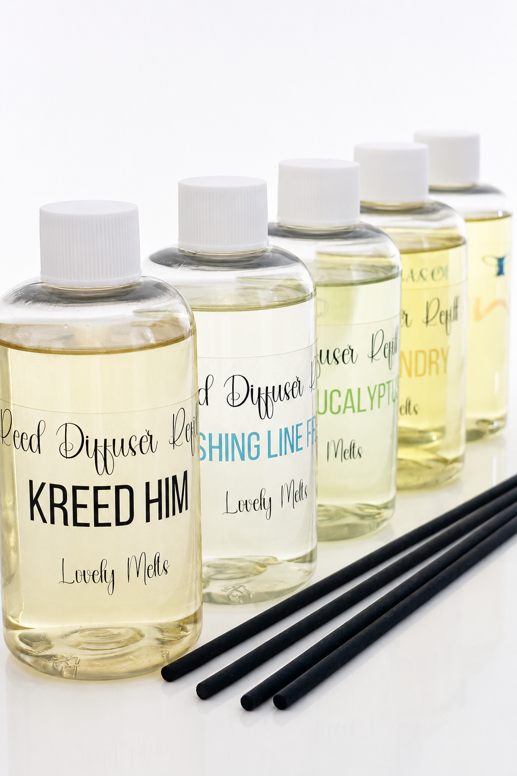 Set of Reed Diffuser Refills with labels on a white background