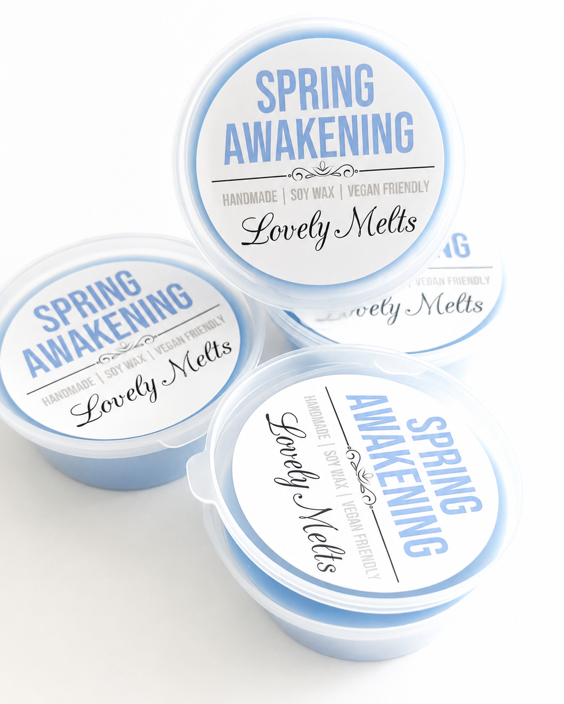 Three containers of 'Spring Awakening' Lovely Melts on a white background