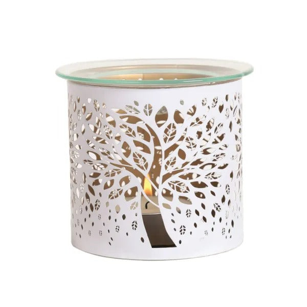 White wax warmer with tree design on a white background