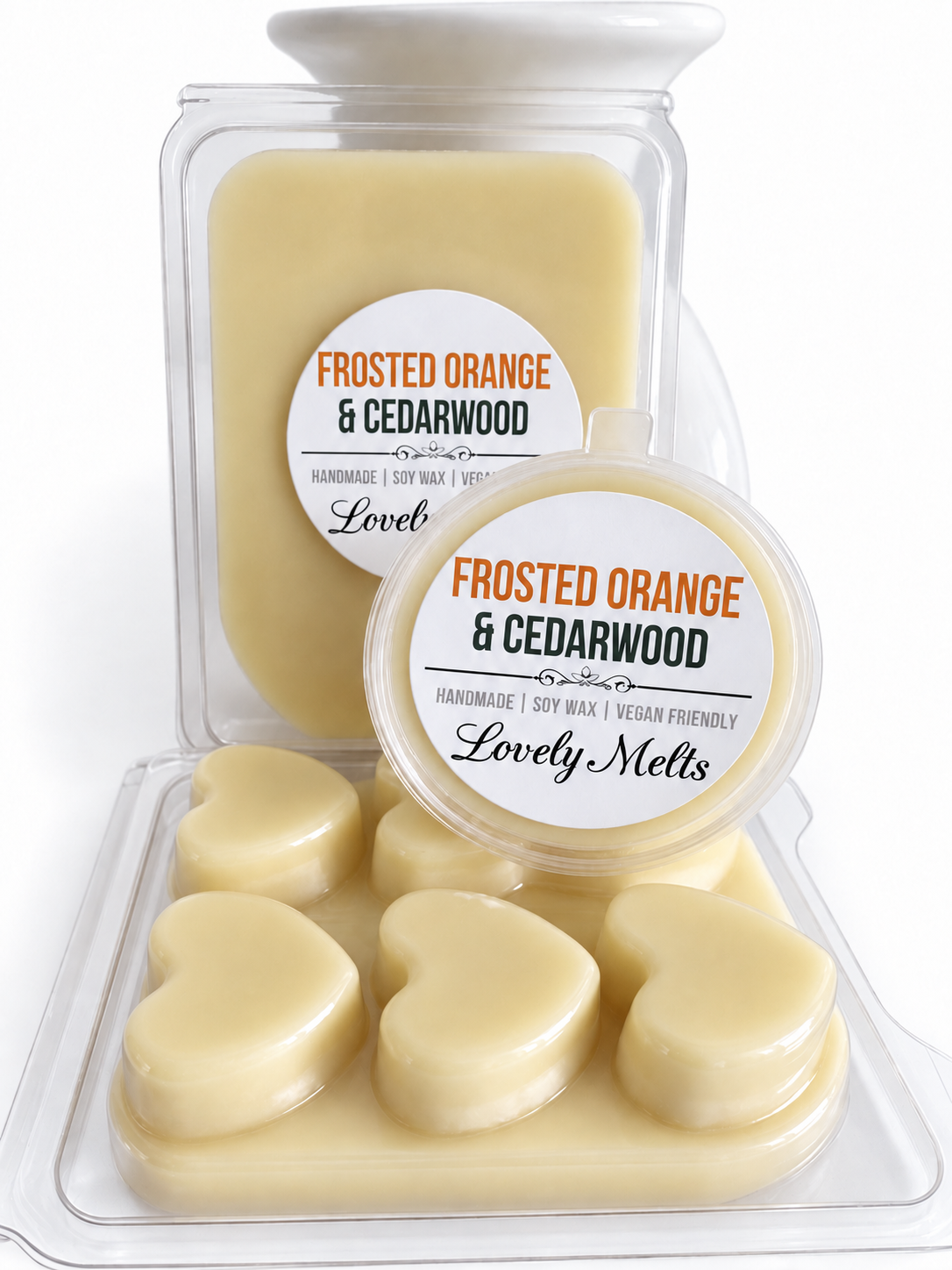 A product display of 'Frosted Orange & Cedarwood' scented soy wax melts by Lovely Melts. 