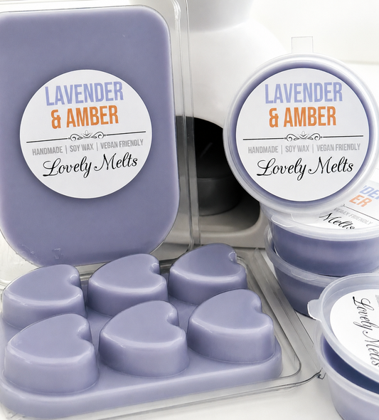 Lavender and Amber wax melts in a heart-shaped mold with packaging.