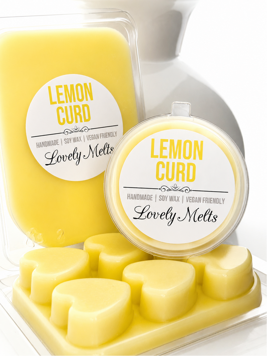 Yellow lemon curd-scented wax melts with 'Lovely Melts' packaging on a white background