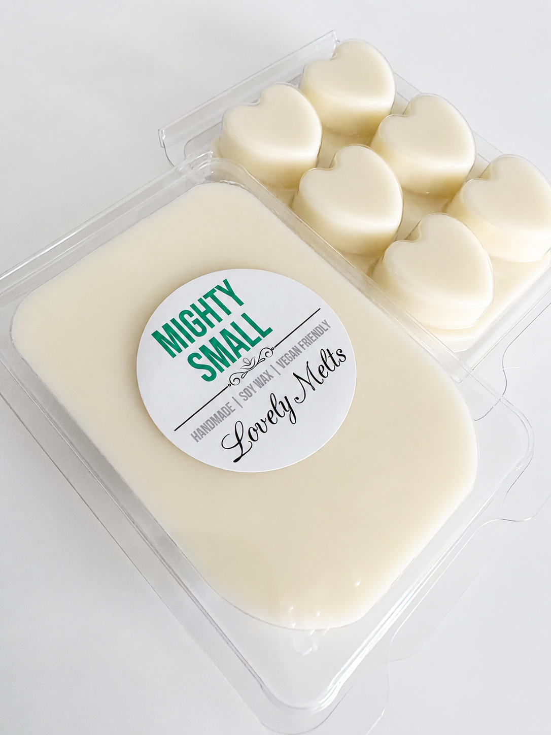Packaged mighty small wax melt bars with a label on a white background