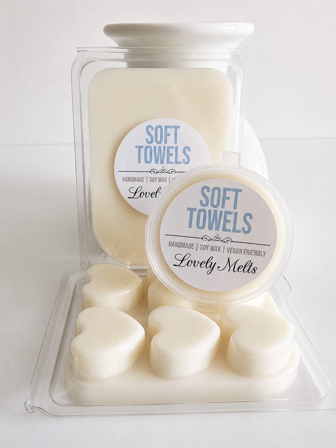 soft towels wax melts in a clear container with 'Lovely Melts' branding on a white background.