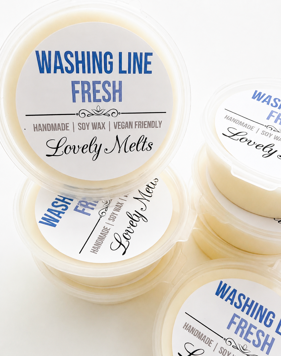 wax melt pots with 'Washing Line Fresh' labels on a white background