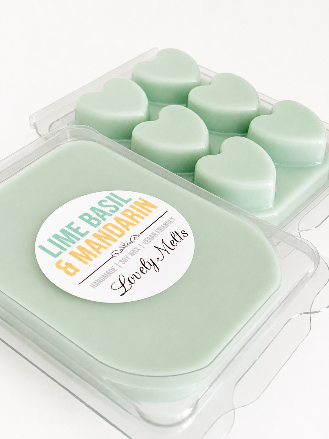 Pack of heart-shaped lime wax melts with a 'Lovely Melts' label on a white background