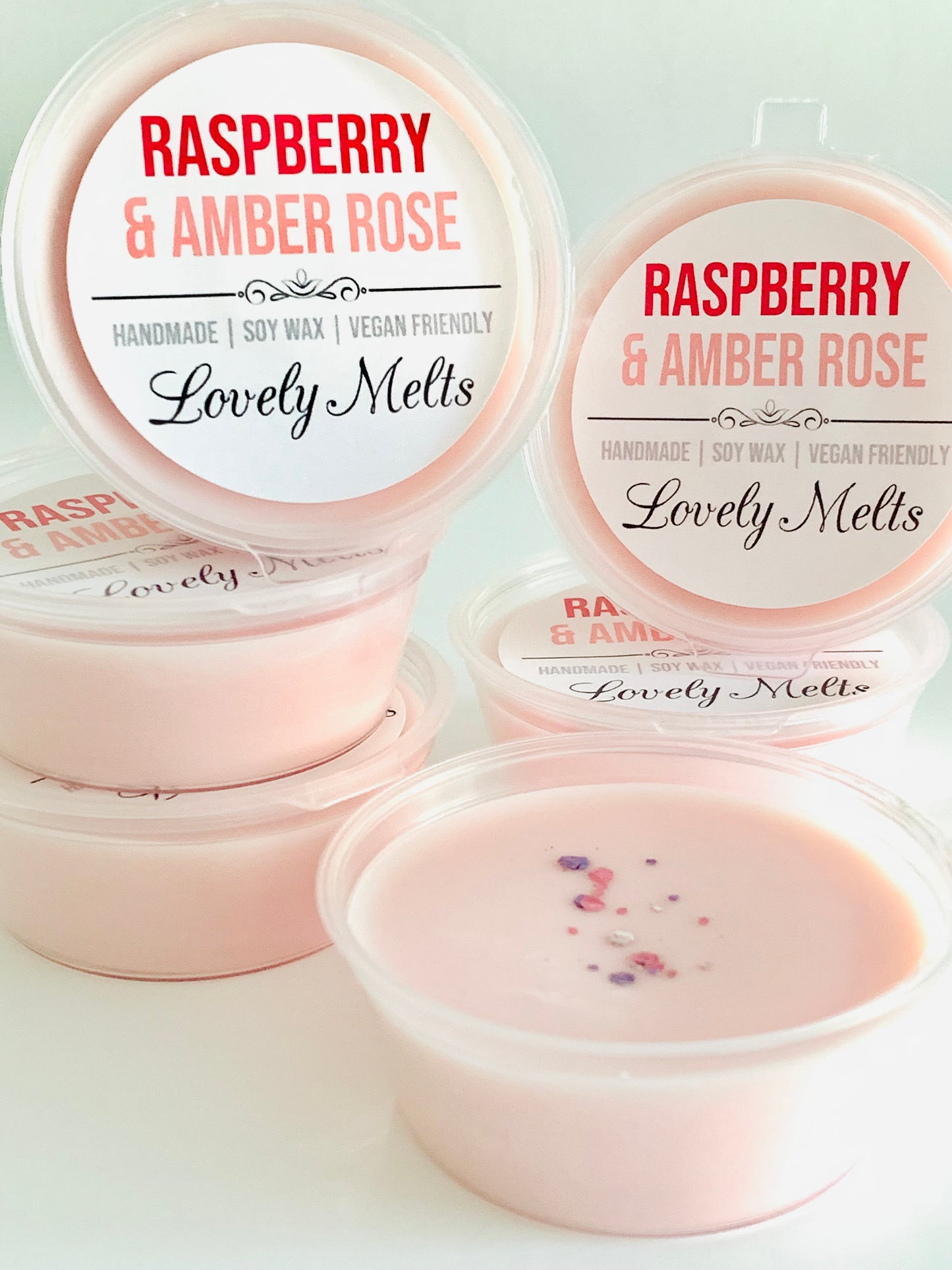 raspberry and amber rose wax melt pots